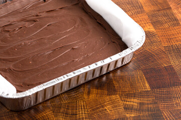 A Square Pan filled with Homemade Milk Chocolate Fudge