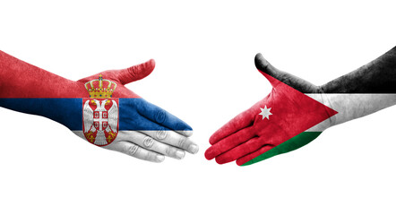 Handshake between Jordan and Serbia flags painted on hands, isolated transparent image.