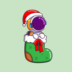The cute astronaut is sitting on the christmas sock waiting for santa gift