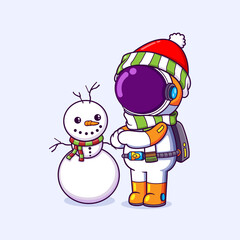 The astronaut is making a snowman in winter season while wearing scarf