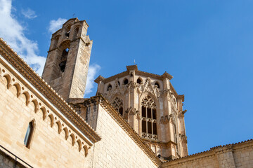 Stone monastery in a small town in Catalonia, in Spain, has a bell tower and a beautiful structure