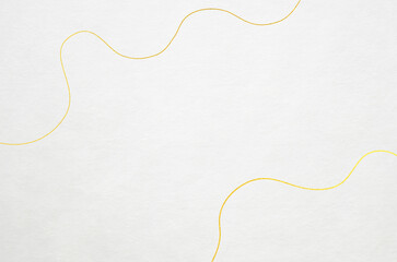 Abstract gold wave pattern on white Japanese washi paper texture. Japanese modern style background.