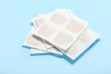 Mustard plasters on blue background