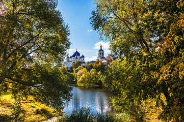 Blue domes of an ancient Orthodox monastery on a sunny autumn day. Bogolyubsky convent of the 12th century.
