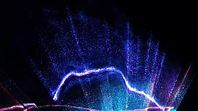 laser show timelapse at night from flat angle