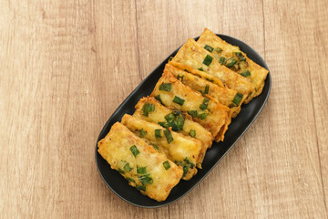 Tempe Mendoan, traditional fried tempeh, one of popular food from Indonesia.