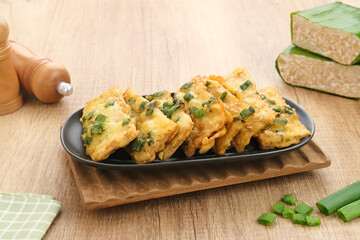 Tempe Mendoan, traditional fried tempeh, one of popular food from Indonesia.