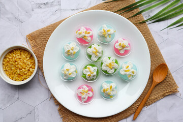 Thai dessert of Mung Bean Flour  with sweet coconut milk on top and sprinkle mung bean : In Thai called Leum Kleun