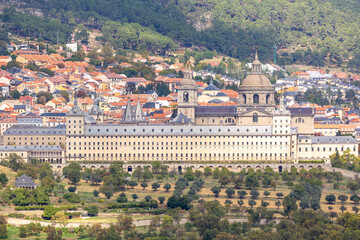 Fototapeta premium views of The Royal Seat of San Lorenzo de El Escorial from the chair of Felipe II, a viewpoint carved into the granite rock in front of the monastery