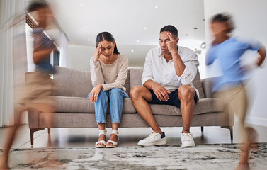 Headache, kids running and parents on a sofa in a living room, suffering stress, anxiety and adhd children. Family, autism and burnout crisis with woman and man in mental health and energy problem - obrazy, fototapety, plakaty