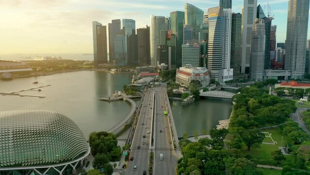 aerial view 4k video of the Singapore City Skyline. Central Area sunrise.