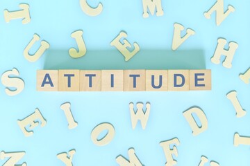 Business attitude concept. Word typography on wooden blocks flat lay.