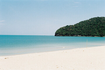 white sand beach with clearly sky