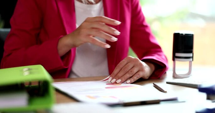 Businessman put seal, financial contract with analytics on table