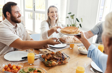 Big family, lunch and food in home dining room with people sharing a meal. Love, happy and...
