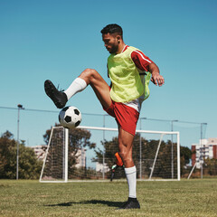 Soccer, training and man with ball on soccer field for fitness, workout and sports practice....