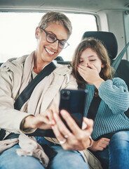 Phone, surprise and mother with child on car journey, travel or road trip for adventure, bond or...