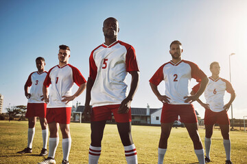 Football, soccer and portrait of team or group on field together ready for a match, game or competition. Fitness, diversity and men or players on grass field preparing for sports, workout or training - Powered by Adobe