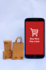 buy now pay later text on red smartphone screen
