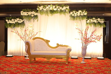 white theme stage decoration with white lace cloth in the background
