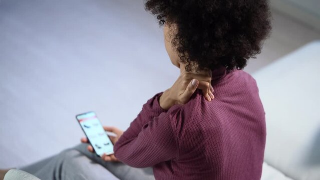 Woman With Neck Pain Sitting
