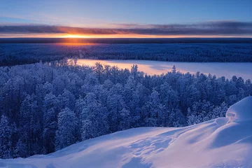 Foto auf Alu-Dibond Winter wonderland in Finnish Lapland. Winter holiday in winter wonderland. Winter landscape sunset. © 2rogan