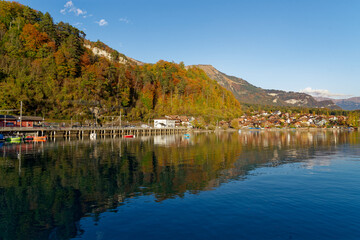 Beautiful scenic landscape at Lake Brienz on a sunny autumn late afternoon. Photo taken October 18th, 2022, Brienz, Switzerland.