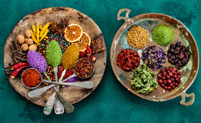 Various spices and dried fruits on the table.