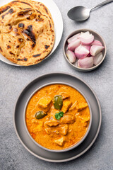 Kadai Paneer is a spicy, flavourful and delicious gravy dish made with  paneer, bell pepper, and onion in a freshly ground spice and served with chappati or lachcha parantha