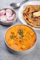 Kadai Paneer is a spicy, flavourful and delicious gravy dish made with  paneer, bell pepper, and onion in a freshly ground spice and served with chappati or lachcha parantha