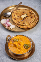 Kadai Paneer is a spicy, flavourful and delicious gravy dish made with  paneer, bell pepper, and onion in a freshly ground spice and served with chappati or lachcha parantha
