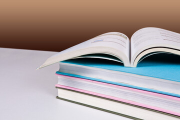 Books and school supplies on a white background with clipping path. You can change the background to whatever you want