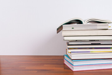 Books and school supplies on a white background with clipping path. You can change the background to whatever you want