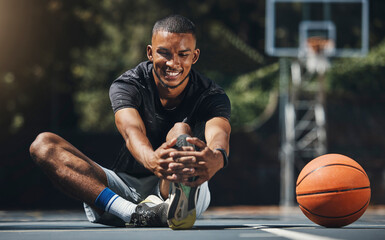 Training, basketball player and man stretching legs in outdoor community court, muscle energy and healthy sports game performance. Happy, strong and young male athlete warm up exercise in competition - Powered by Adobe