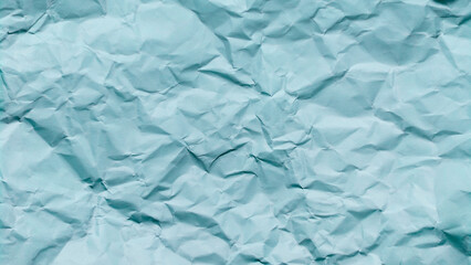 crumpled paper texture background with blue color