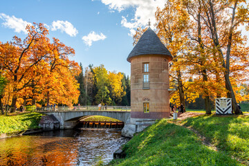 Fototapeta na wymiar Pil tower in Pavlovsky park in autumn, Pavlovsk, Saint Petersburg, Russia