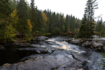 Picturesque waterfall in Ruskeala in autumn, Karelia, Russia