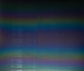 high res macro photo of abstract pastel iridescent holographic foil background. holo color wrinkled...