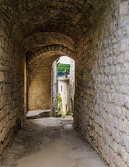  The narrow cobblestone street of the medieval village of Balazuc in the South of France (Ardeche)