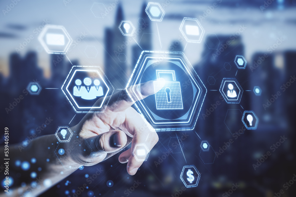 Poster close up of businessman hand using abstract glowing padlock hologram on blurry city background. secu