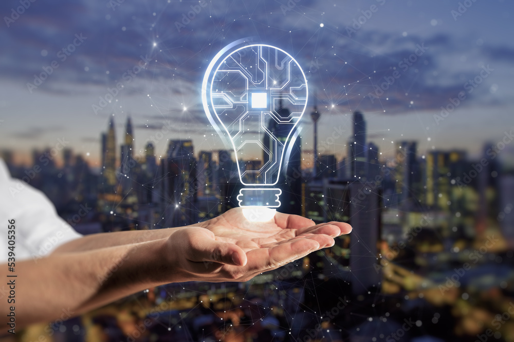 Poster close up of businessman hands holding abstract glowing light bulb with chip hologram on blurry city 