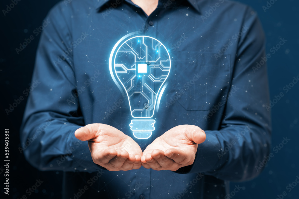 Poster Close up of man hands holding abstract glowing light bulb with chip hologram on blurry dark background. Artificial intelligence and neural network concept.