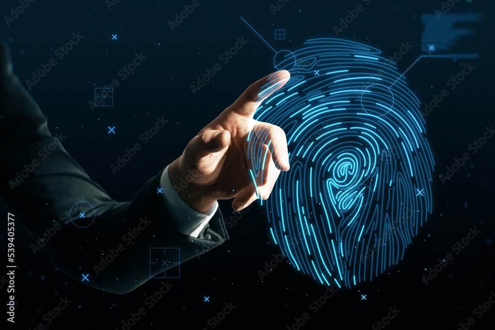 Poster close up of businessman hand pointing at abstract glowing finger print id hologram on dark backgroun