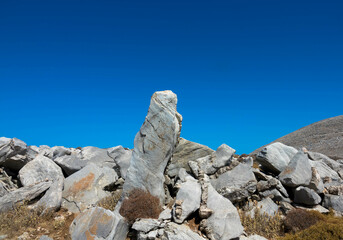 Spectacular panorama view of the bizarre rock formation on top of the Attavyros mountain. The...