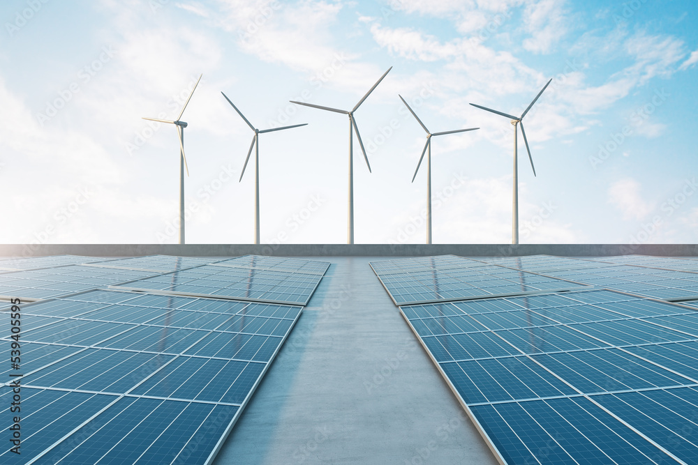 Poster renewable energy concept with concrete trail between solar panels and wind turbines on blue sky back