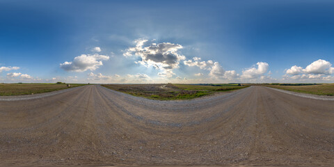 full seamless spherical hdri 360 panorama view on no traffic gravel road among fields with overcast...