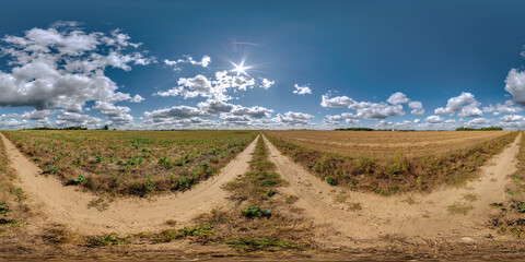 full seamless spherical hdri 360 panorama view on no traffic gravel road among fields with overcast sky and white clouds in equirectangular projection,can be used as replacement for sky in panoramas