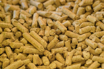 Close up view of stove fuel pellets material, winter home heating 