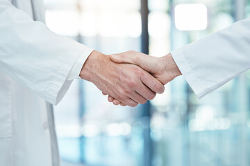 Handshake, doctors meeting or teamwork for partnership, collaboration or support for medical...