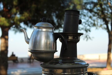 Tea urn semavers are ordered nicely at garden